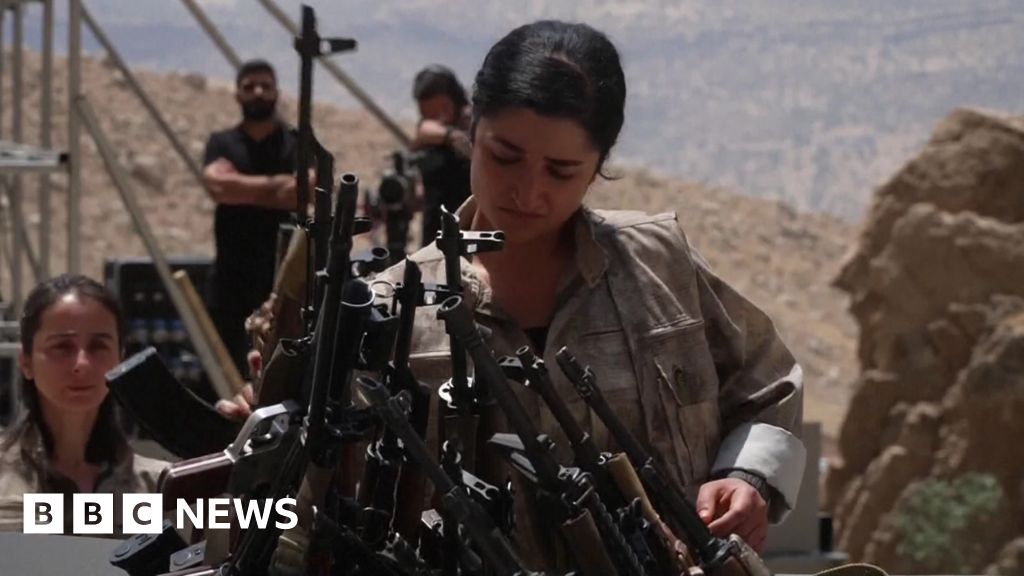 Kurdish PKK burns guns in big step towards ending Turkey conflict