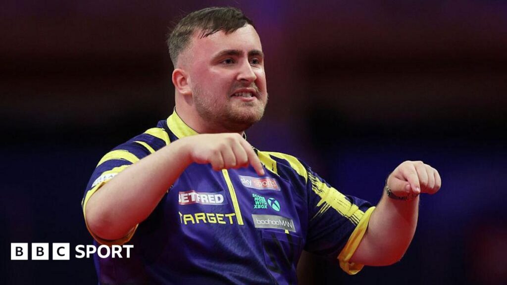 World Matchplay Darts: Luke Littler wins thriller but Michael van Gerwen is out