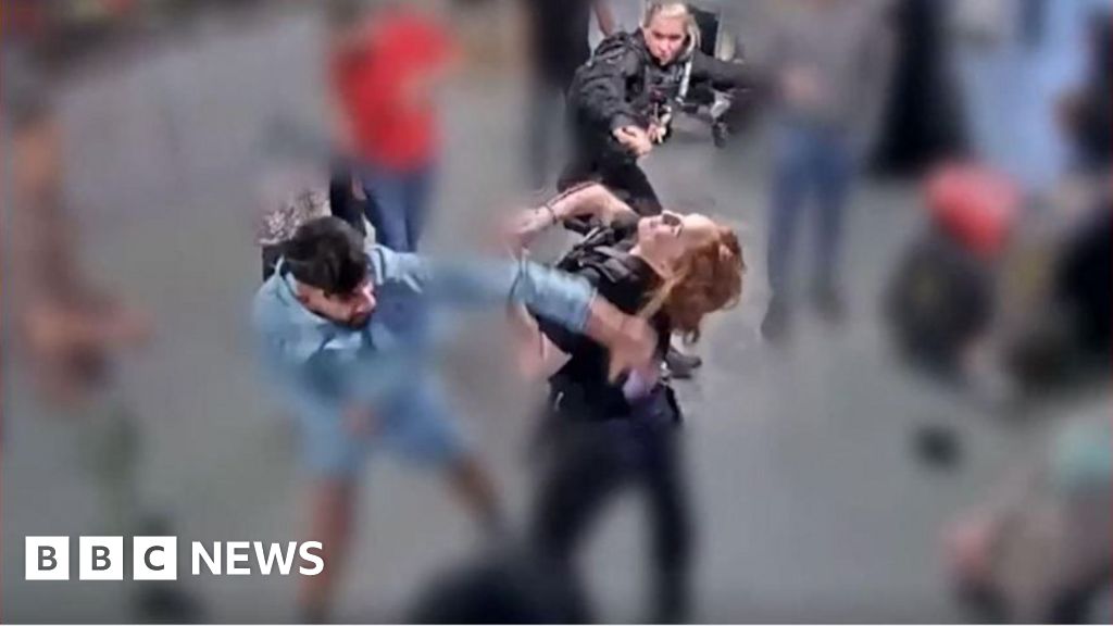 Jury shown CCTV of alleged assault on police at Manchester airport