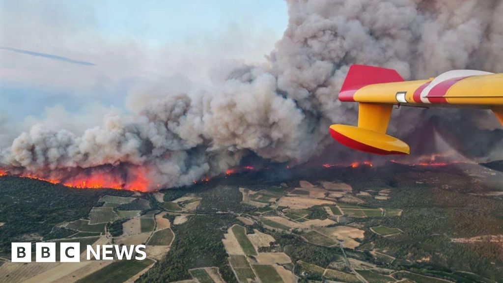 One dead and thousands evacuated as wildfire spreads in France