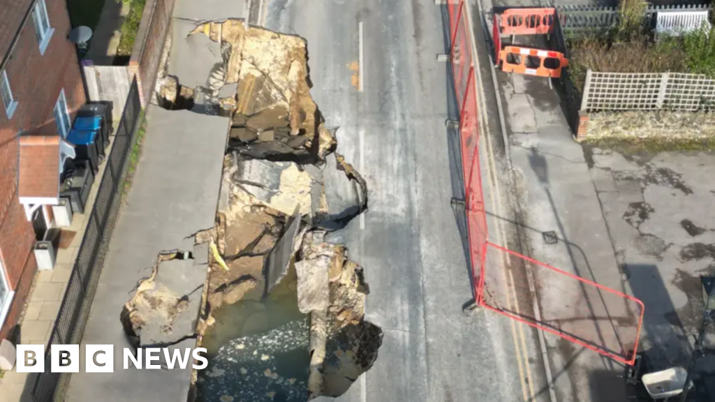 Godstone sinkhole linked to burst water main, engineers say Godstone sinkhole linked to burst water main, engineers say