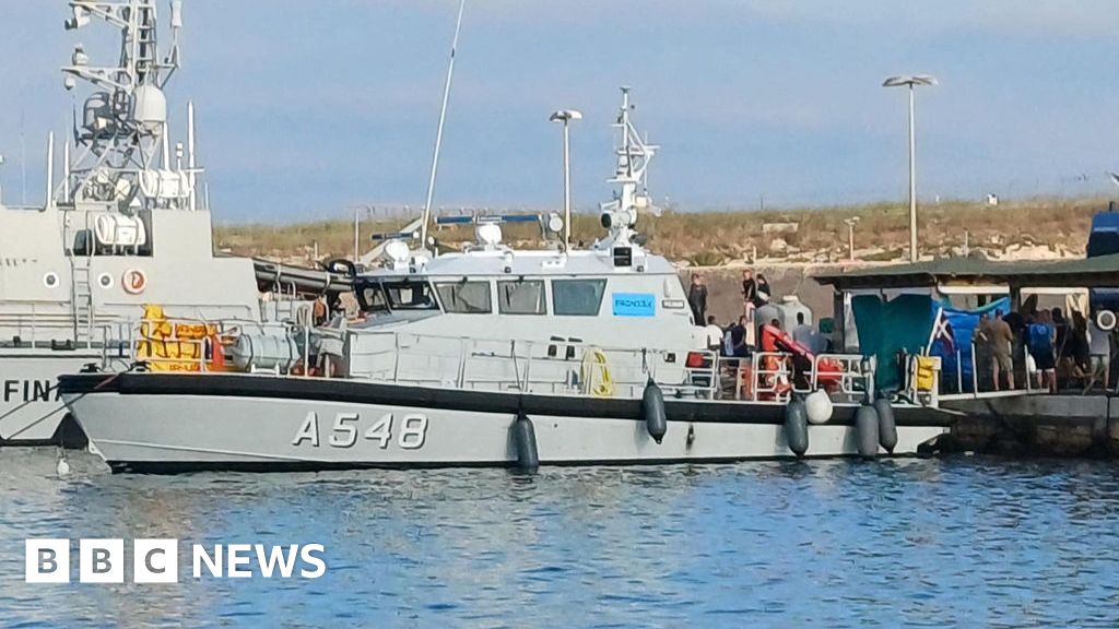 Migrant boats capsize off Italian coast, killing at least 27