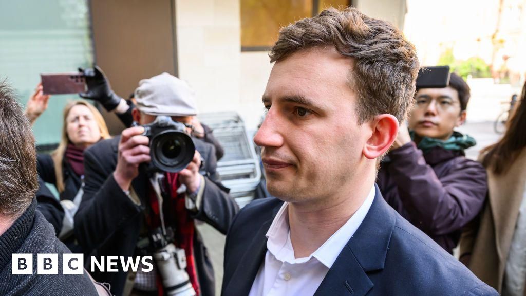 Charges dropped against two men accused of spying for China Charges dropped against two men accused of spying for China