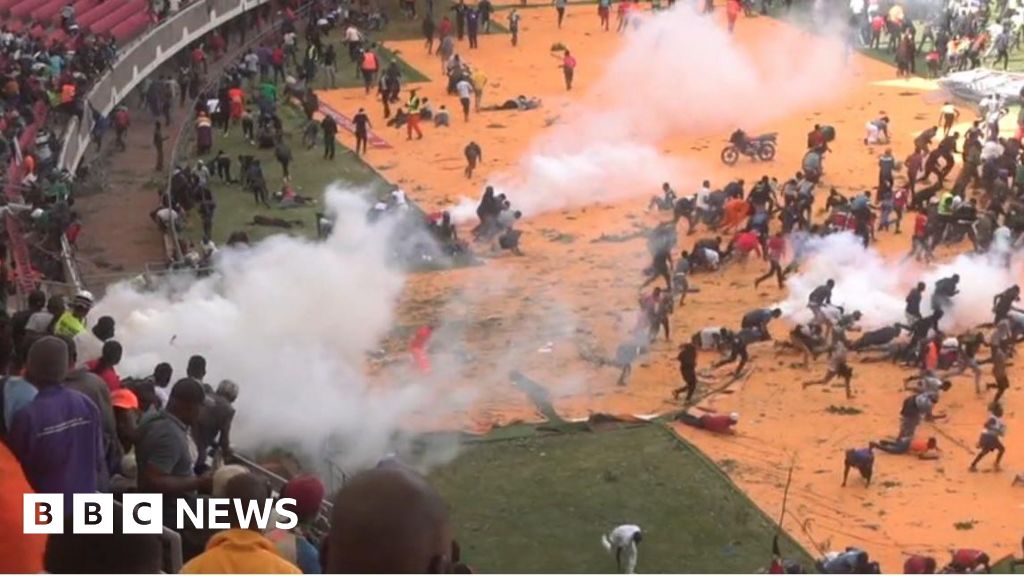 Kenyan police fire shots and tear gas to disperse crowds at Kasarani stadium