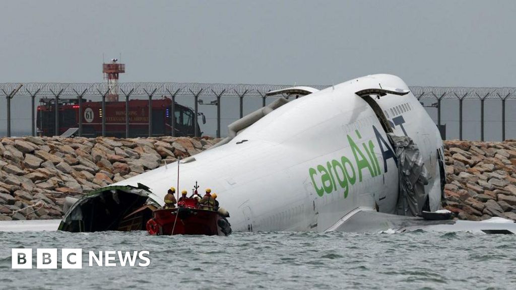 Emirates cargo plane skids off runway into sea at Hong Kong International Airport Emirates cargo plane skids off runway into sea at Hong Kong International Airport