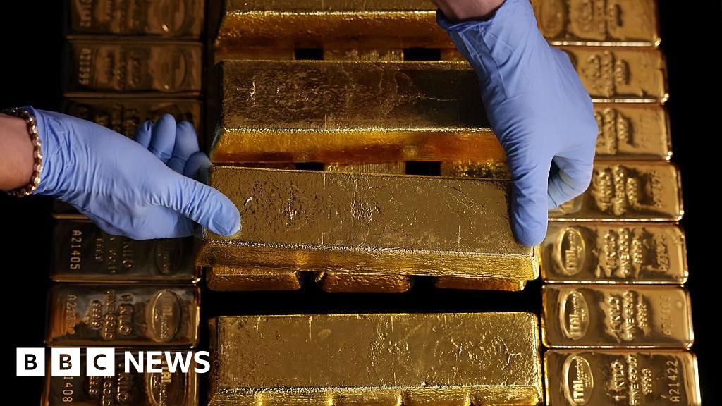 Gold hits record ,000 an ounce as uncertainty fuels rally