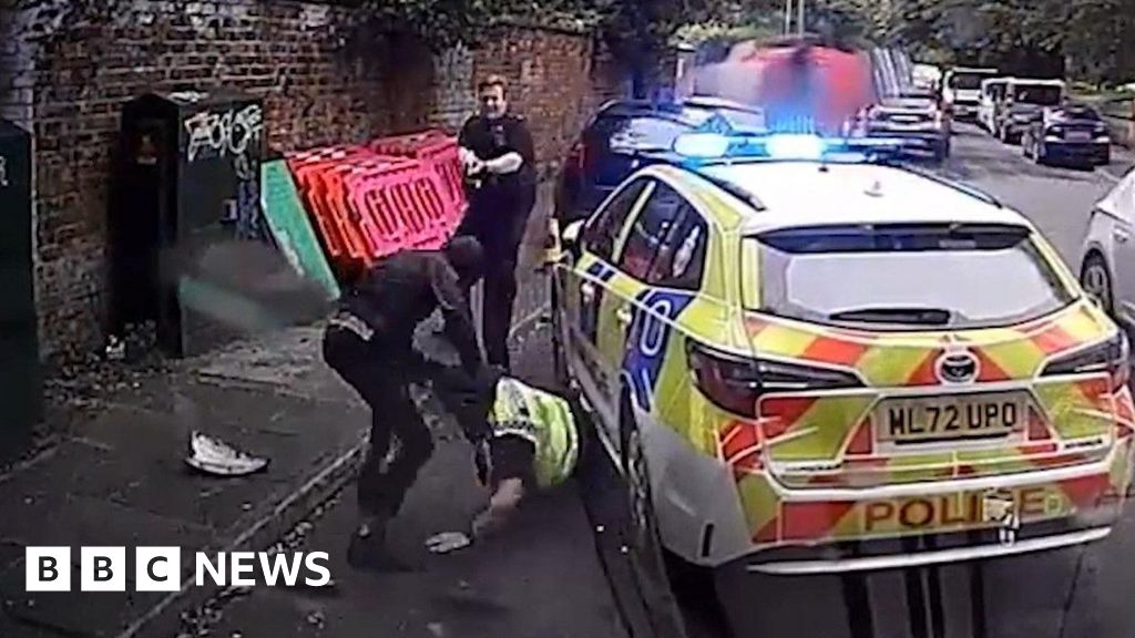 Footage shows moment two Manchester police officers stabbed in ambush