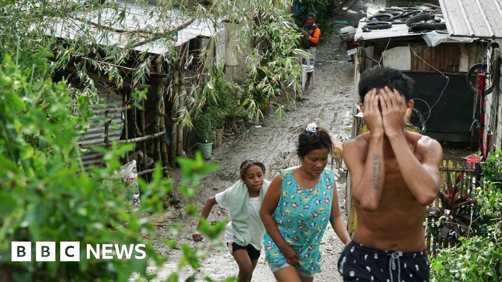 More than a million evacuated as typhoon passes Philippines
