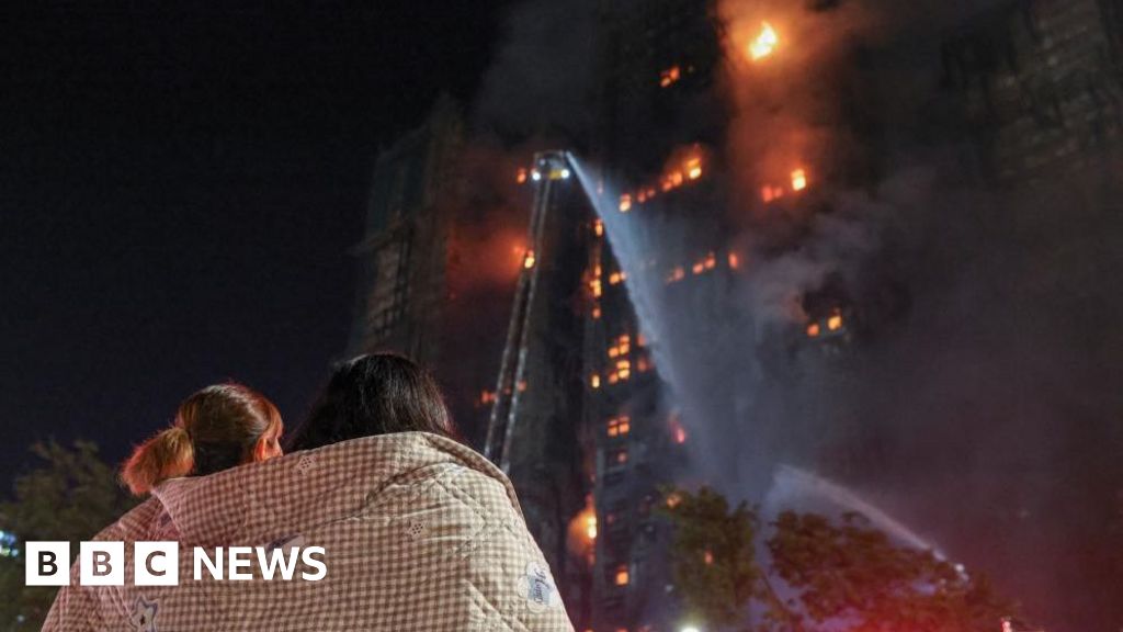 Agonising wait for hundreds missing after Hong Kong blaze