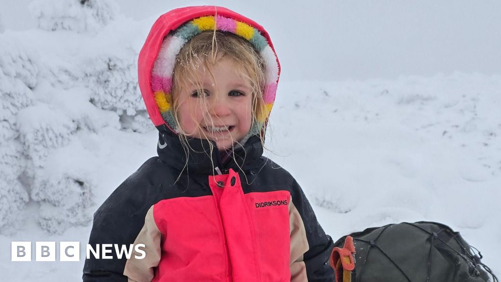 Faye, 5, battles snow and ice to climb Ben Nevis