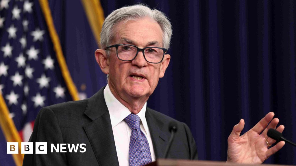 Fed Reserve cuts interest rates, but tempers outlook for further easing