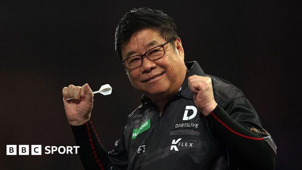 World Darts Championship: Paul Lim, 71, becomes oldest player to win match with victory over Jeffrey de Graaf