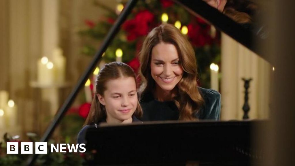 Catherine and Charlotte perform Christmas carol service piano duet