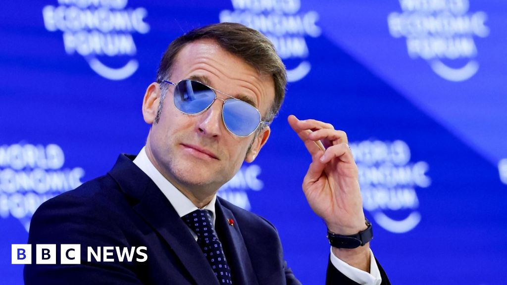 Why was the French president wearing sunglasses at Davos?