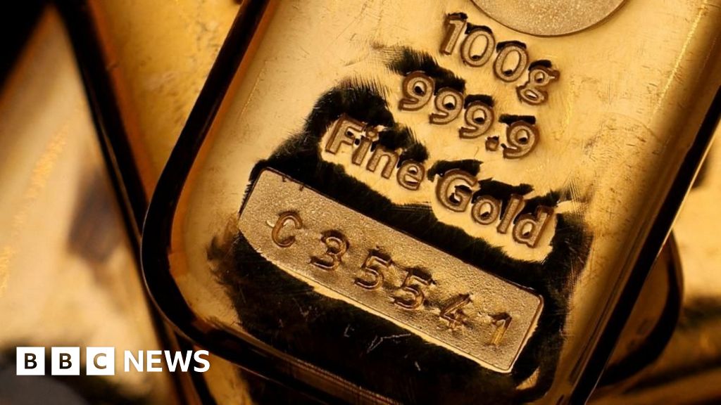 Gold tops ,000 for first time ever, adding to historic rally