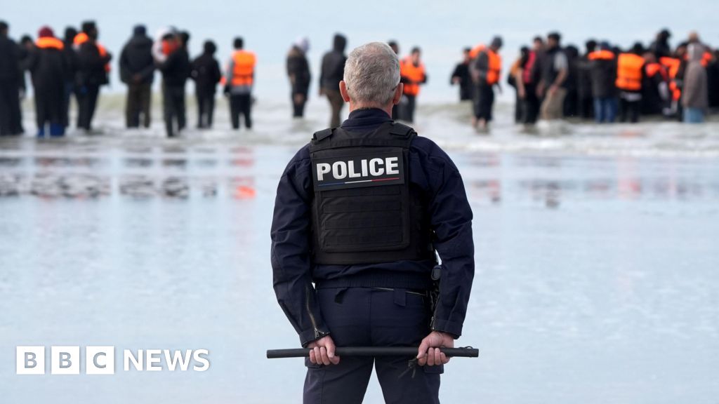 UK has removed 281 migrants under France deal, minister says