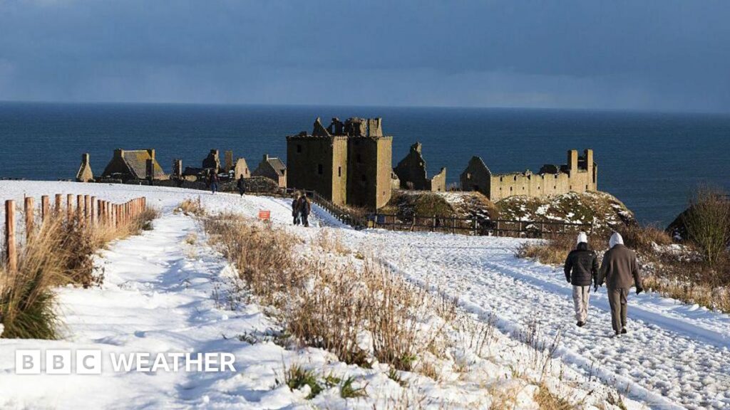 UK weather: snow and ice warnings in force as Arctic air sweeps in for new year