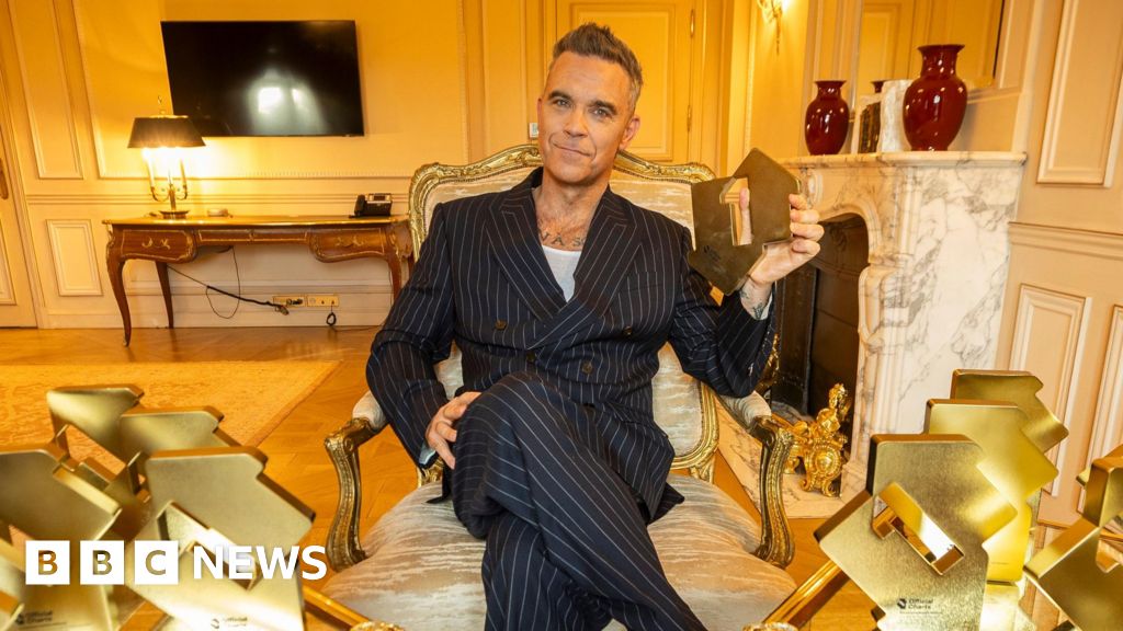 Robbie Williams breaks The Beatles’ chart record with his 16th number one album Britpop