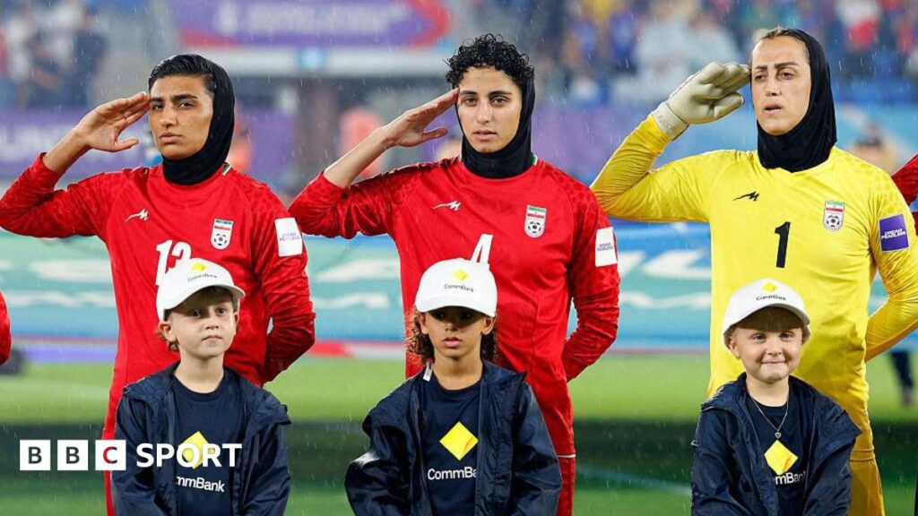 Iran women’s football team are ‘heroes’ after national anthem stand, says former Iran men’s coach